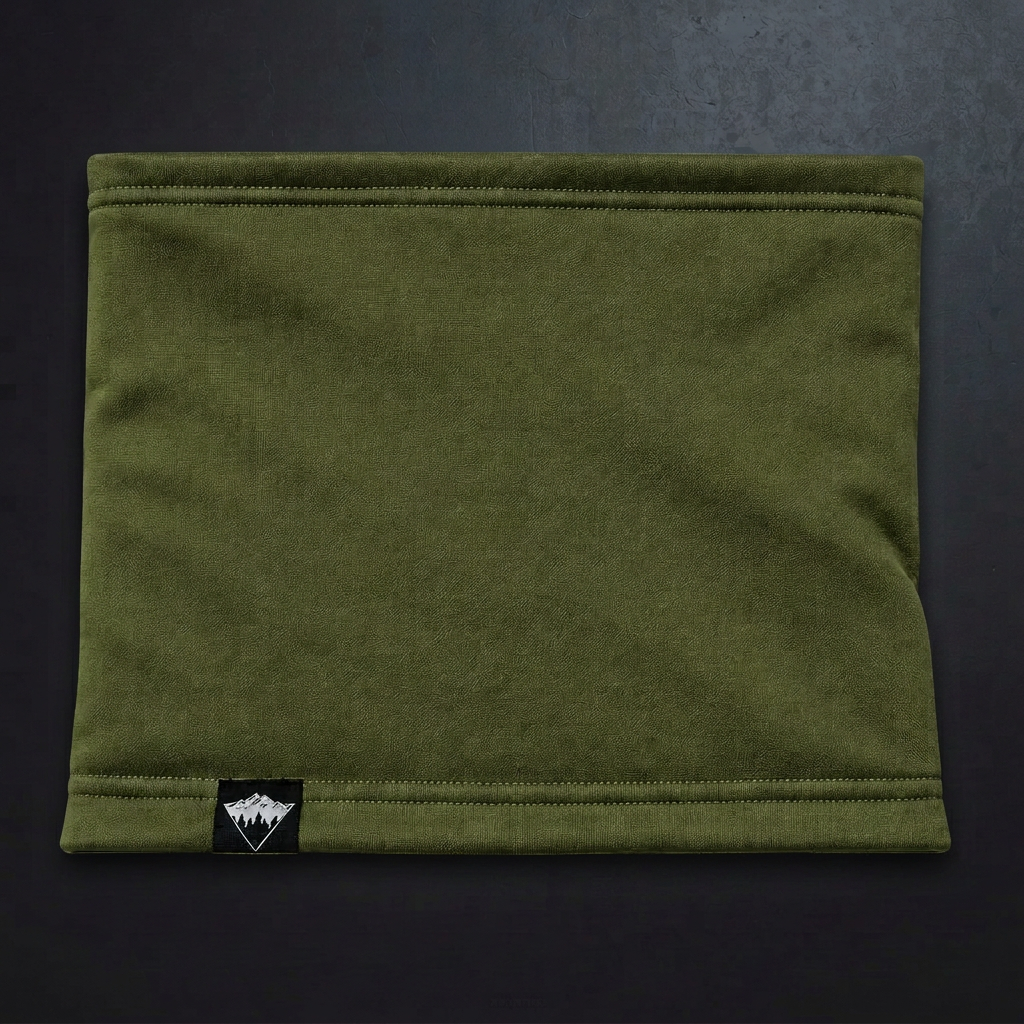 Army Green Basecamp Gaiter on matching concrete background